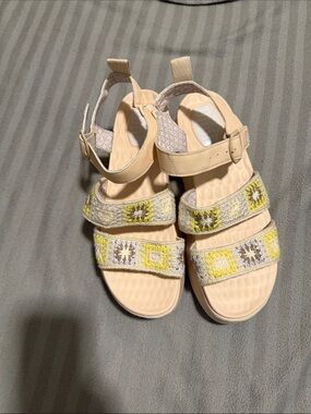 Hey Dude wedge sandals with crocheted accent straps.